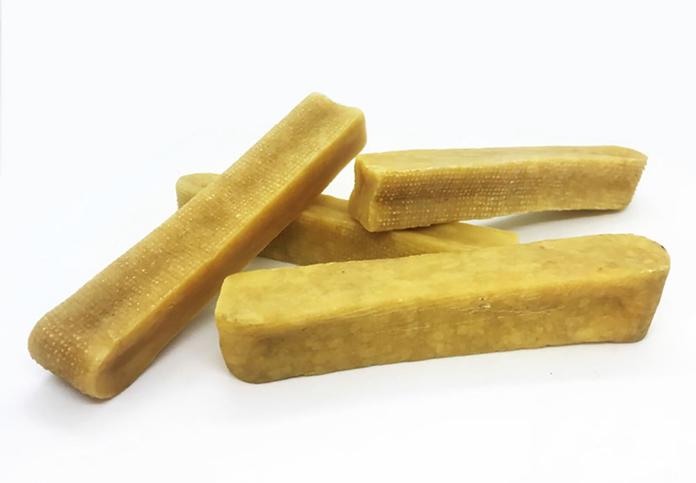 1 lb and 3 lb EcoKind Yak Chew packaging shown with product contents