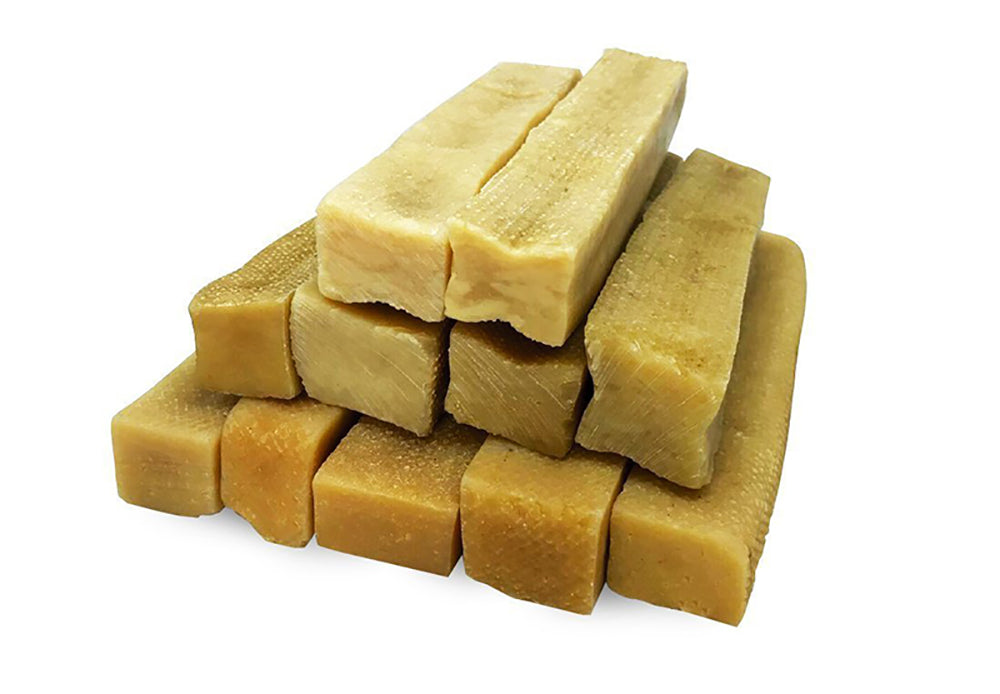 EcoKind Himalayan Gold Yak Dog Chews displayed on a neutral background with resealable bag