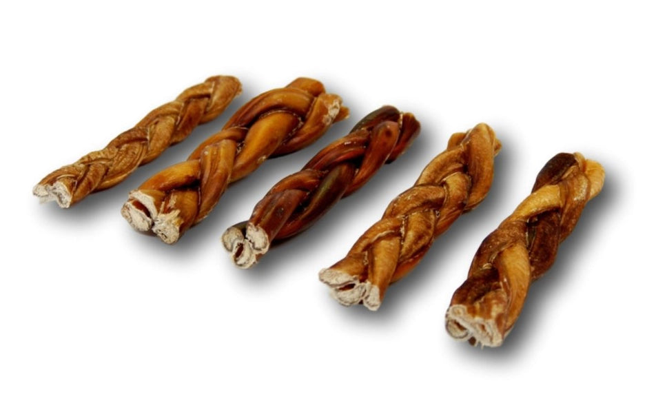 Five braided bully dog treats on a white background