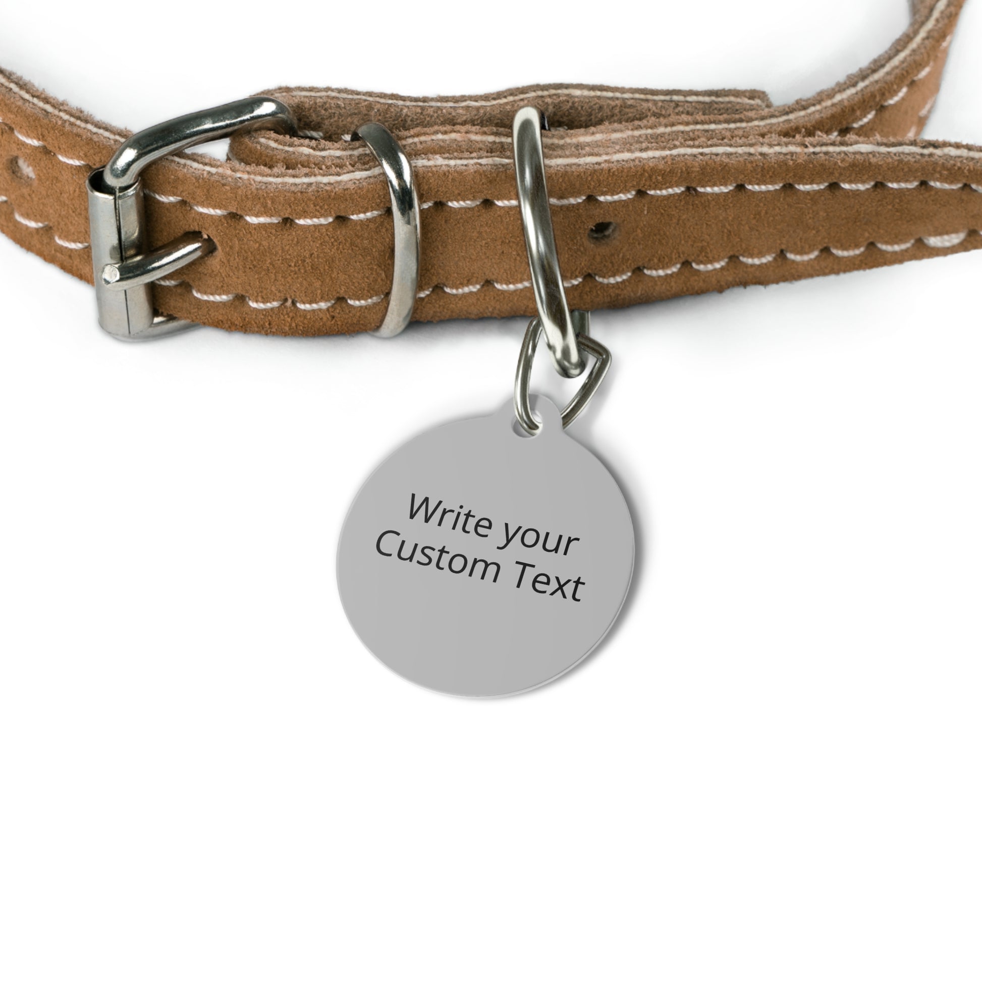 Brown leather dog collar with a metal tag on a white background